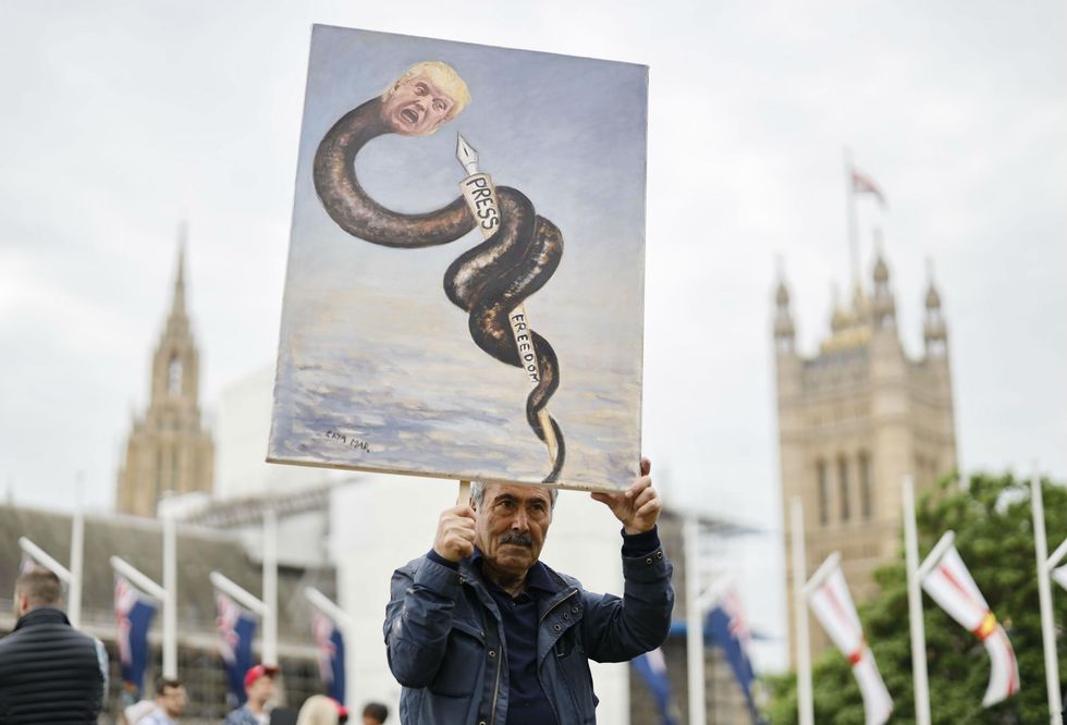 on June 4, 2019, on the second day of their three-day State Visit to the UK. - US President Donald Trump turns from pomp and ceremony to politics and business on Tuesday as he meets Prime Minister Theresa May on the second day of a state visit expected to be accompanied by mass protests.