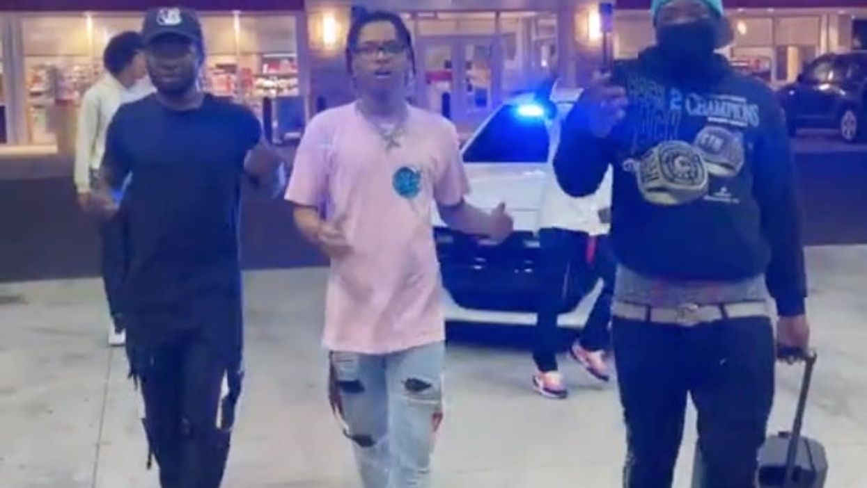 <p>One of the friends was nudged by a police car as the group performed a dance routine</p>