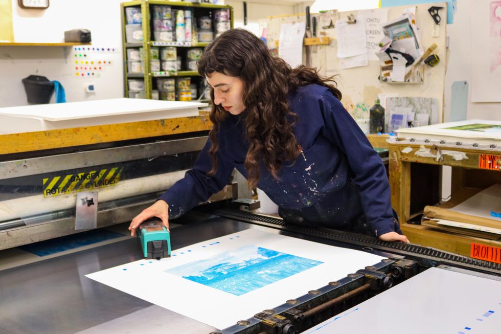 One of the limited-edition prints being made