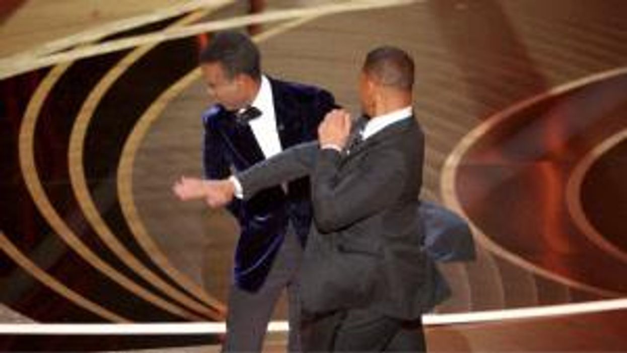 Jean-Claude Van Damme's staged red carpet slap resurfaces after Will Smith incident