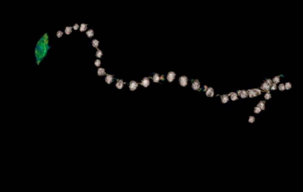 (PA/ Sahar Saleem and Zahi Hawass) Reconstructed image of a golden beaded girdle with a snail amulet worn by Amenhotep I beneath the wrappings only revealed clearly by CT scan
