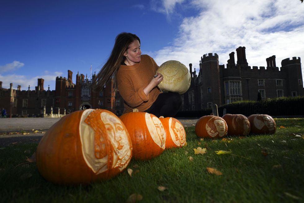 Palace gardener Justine Howlett adds some finishing touches (Steve Parsons/PA)