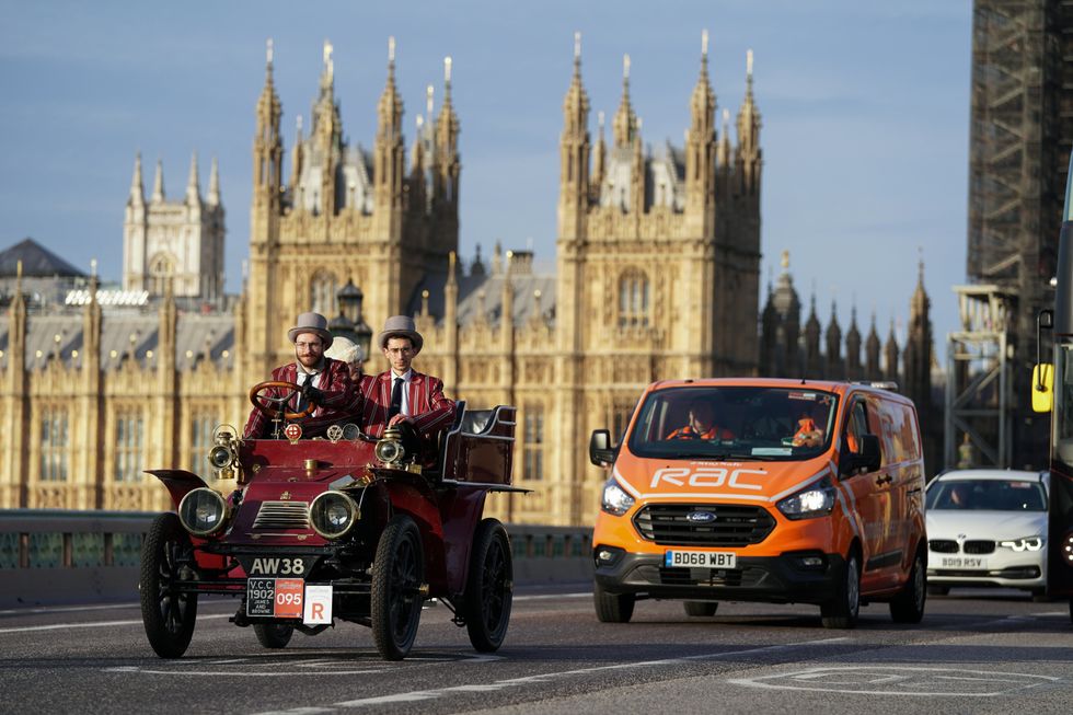 Participants are followed by an RAC breakdown vehicle as they drive over Westminster Bridge (Kirsty O\u2019Connor/PA)