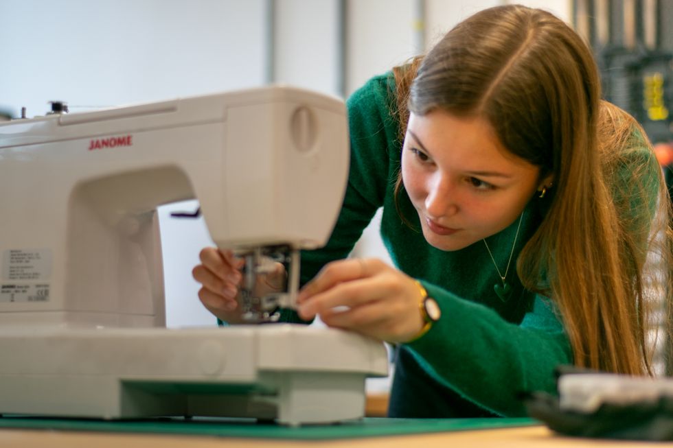 Pascha Al-Qassab is using her needlework skills to repair friends\u2019 clothes and make last-minute dresses for nights out (University of Bristol/PA