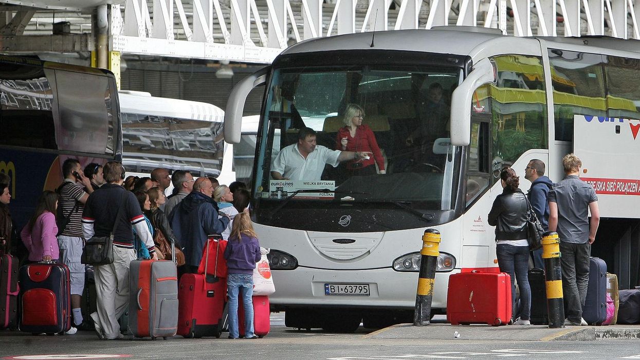 Passengers board a bus leaving for Poland from Victoria coach station on May 20, 2009 in London, UK. Picture: Dan Kitwood/Getty Images