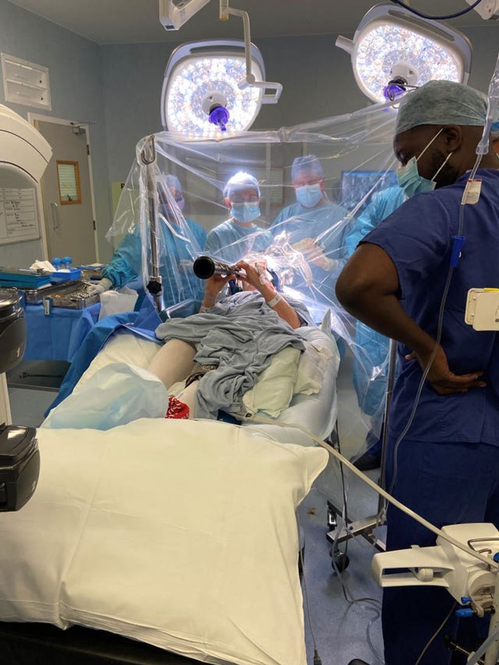 Patient plays clarinet during surgery