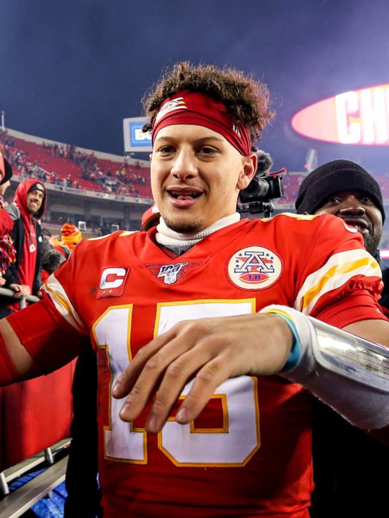 Patrick Mahomes celebrates with fans ahead of Super Bowl LVIII