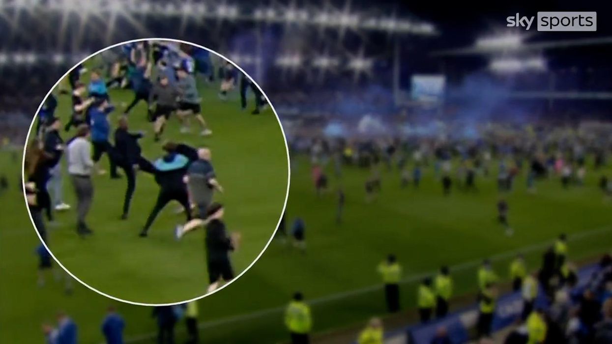 Everton fan slaps Crystal Palace player on bottom during frantic touchline melee