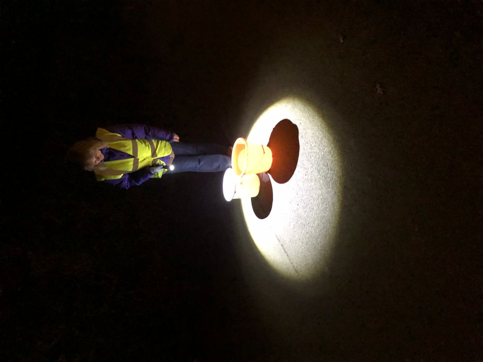 Patroller walking along Charlcombe Lane for this year's toad patrol (Charlcombe Toad Rescue Group/PA)