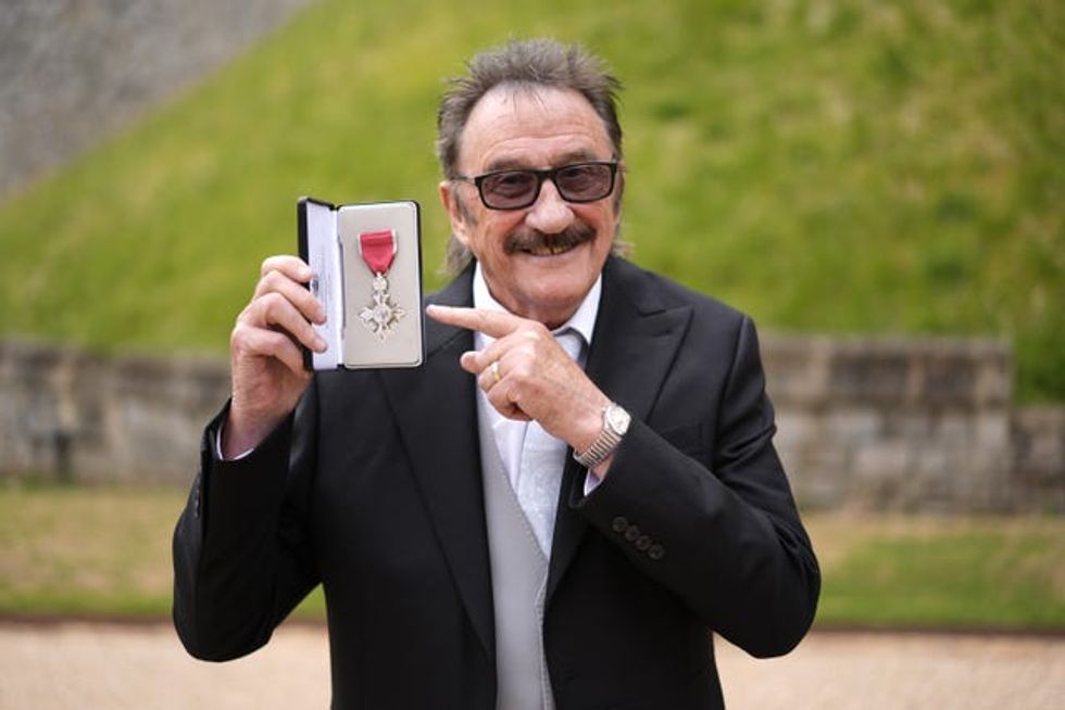 Paul Elliott after being made a Member of the Order of the British Empire by the King at Windsor Castle