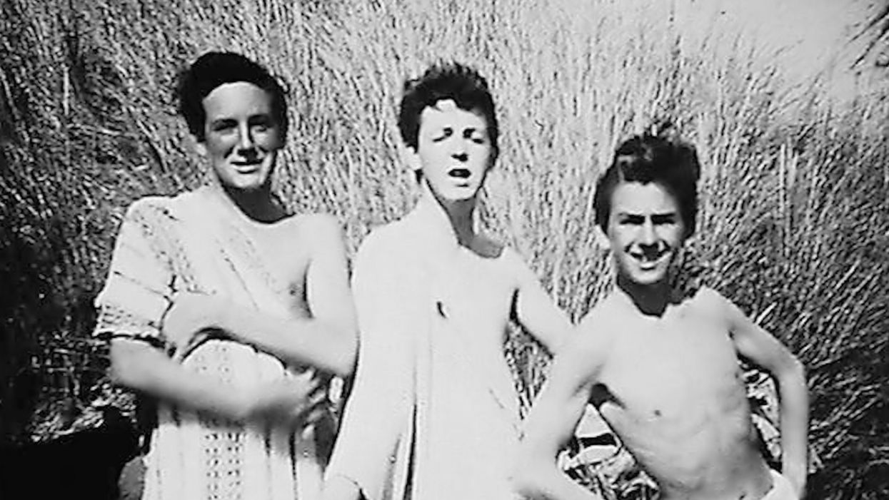 Paul McCartney and George Harrison on holiday in Harlech, North Wales, with John Brierley, pictured left