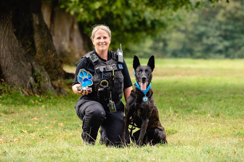 Pc Kelly Walker and Dutch shepherd Bart (Penny Bird/Thin Blue Paw Awards/PA)