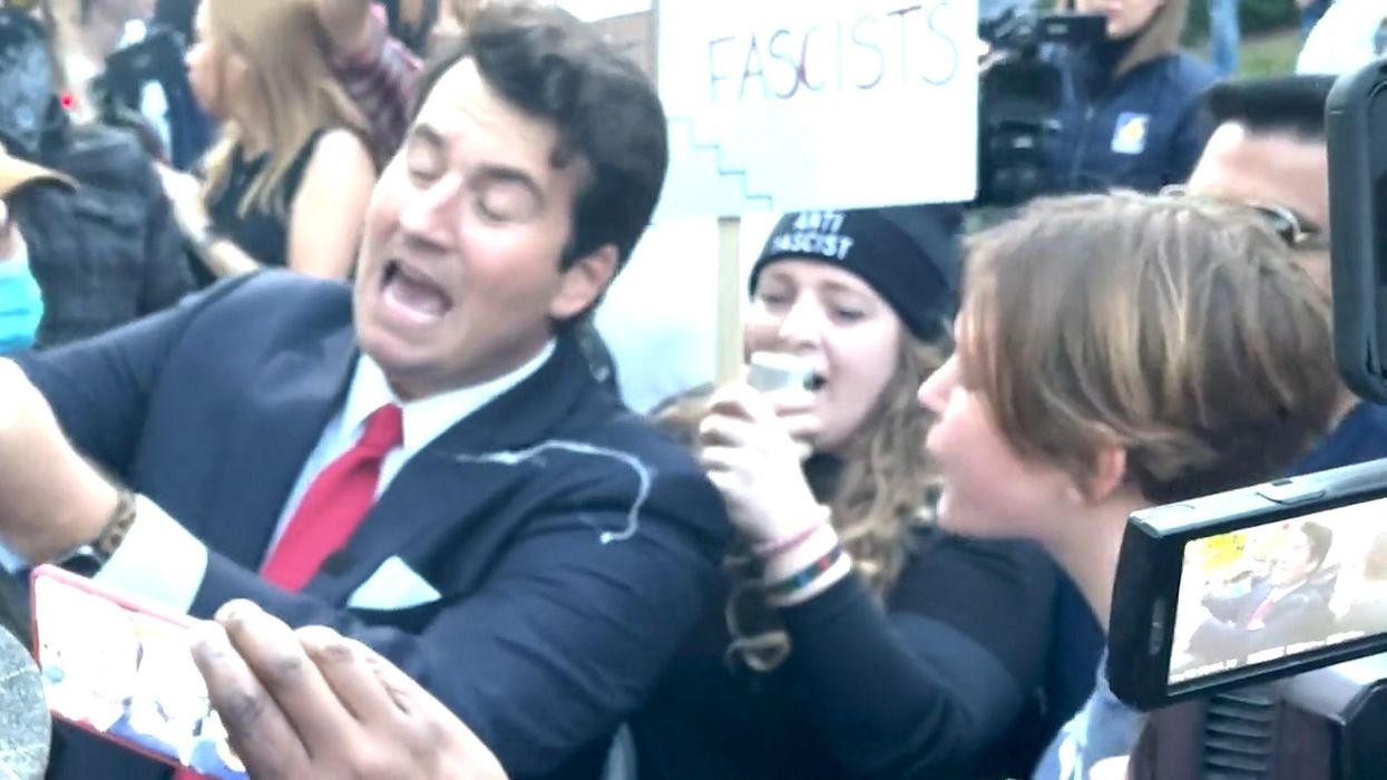 Penn State student spits on right-wing troll during protest