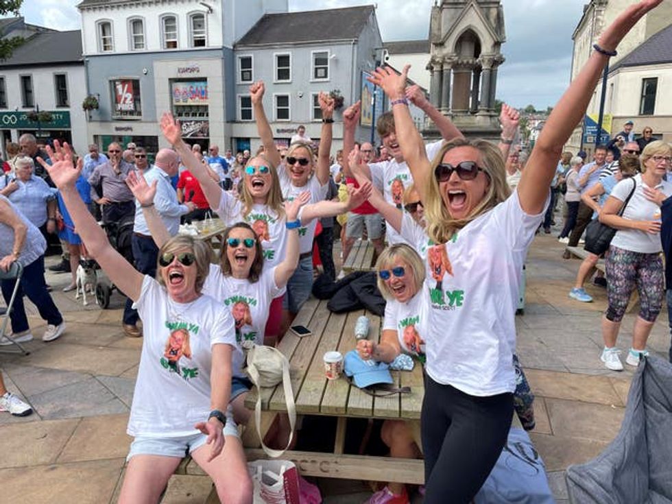 People in the centre of Coleraine in Northern Ireland at an Olympic big screen watch-along event for the final of the women\u2019s quadruple sculls.