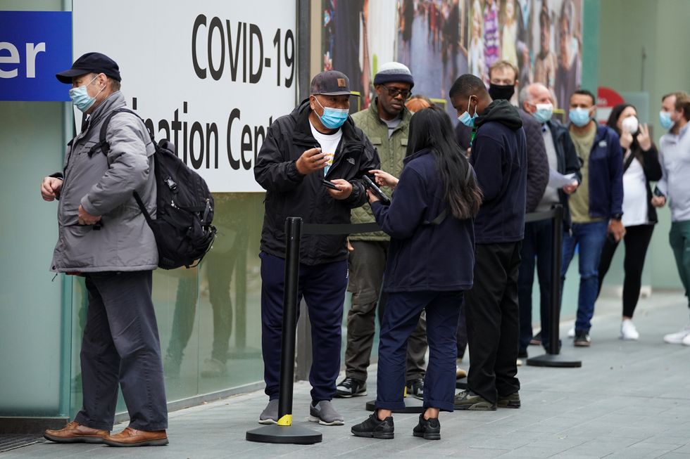 People queue to receive a Covid-19 jab at the pop-up centre (Kirsty O\u2019Connor/PA)