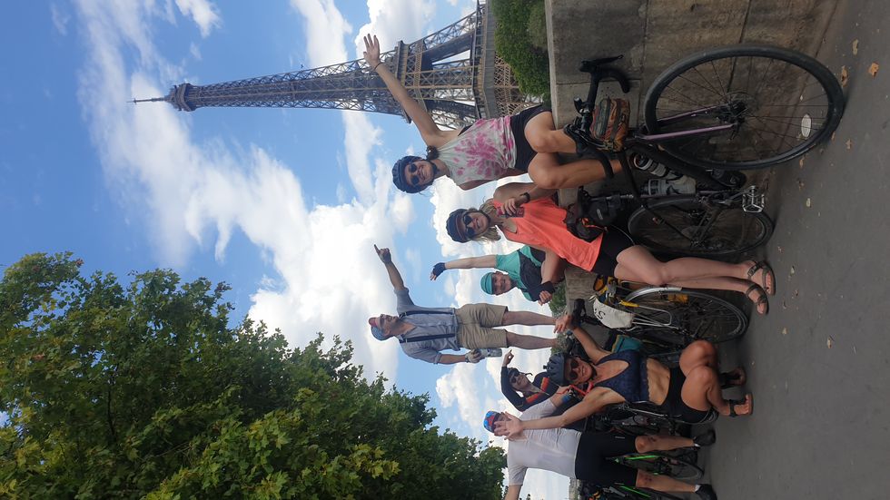 People sitting and standing next to each other