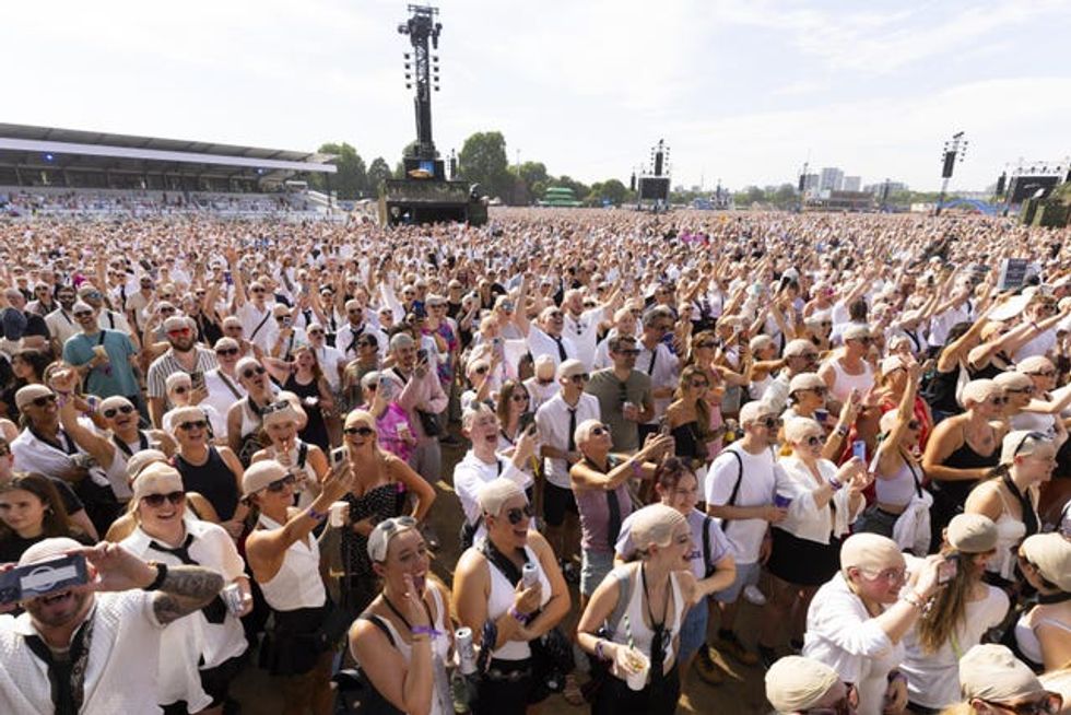People take part in a Guinness World Records attempt for the largest gathering of people wearing bald caps ahead of Pitbull\u2019s headlining show at BST Hyde Park
