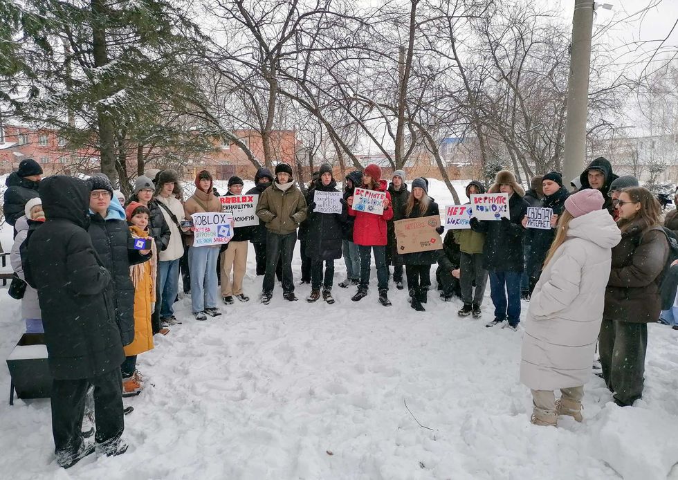 People take part in a protest against Russia's ban on US children's gaming platform Roblox in the Siberian city of Tomsk, Russia, December 14, 2025