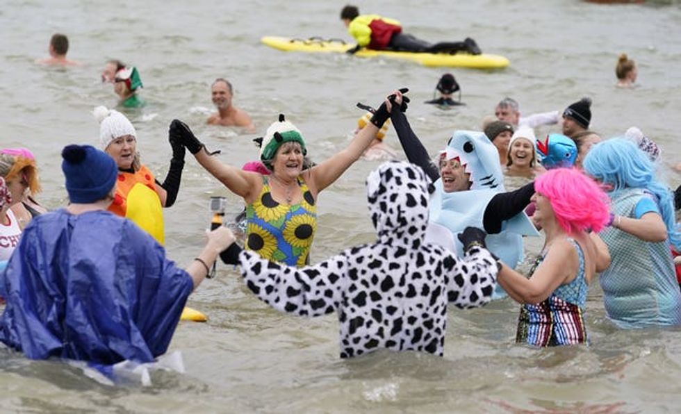 People take part in New Year's Day dip