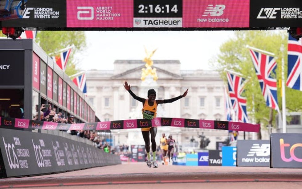 Peres Jepchirchir crosses the line to win the women\u2019s elite race and breaking the women\u2019s record during the TCS London Marathon 2024.