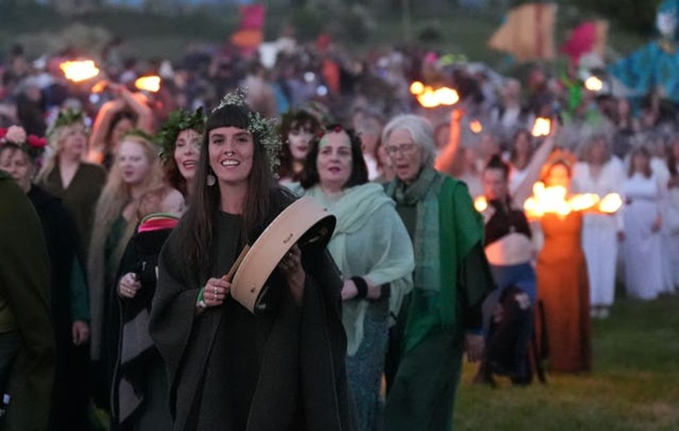 Performers during the Bealtaine Fire Festival at the Hill of Uisneach in Co Westmeath