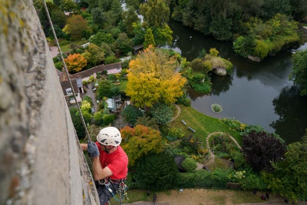 In Pictures: Abseiling experts give Warwick Castle a clean-up | indy100