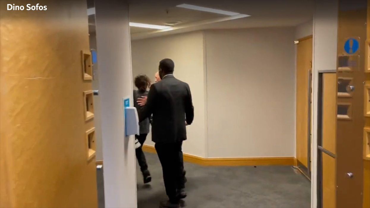 Photographer gets dragged out of Tory conference by security