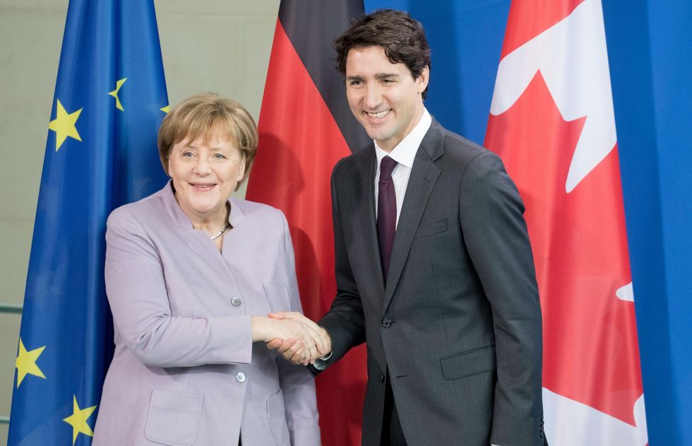 Picture: Canadian prime minister Justin Trudeau and German Chancellor Angela Merkel shake hands after a joint press conference on February 17, 2017 in Berlin/