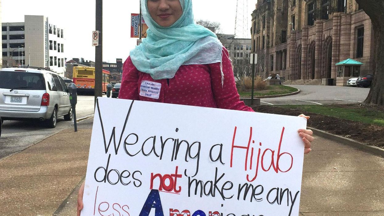 Picture:Michael B Thomas/Getty/woman holds sign in protest of Donald Trump in St Louis, March 11, 2016*