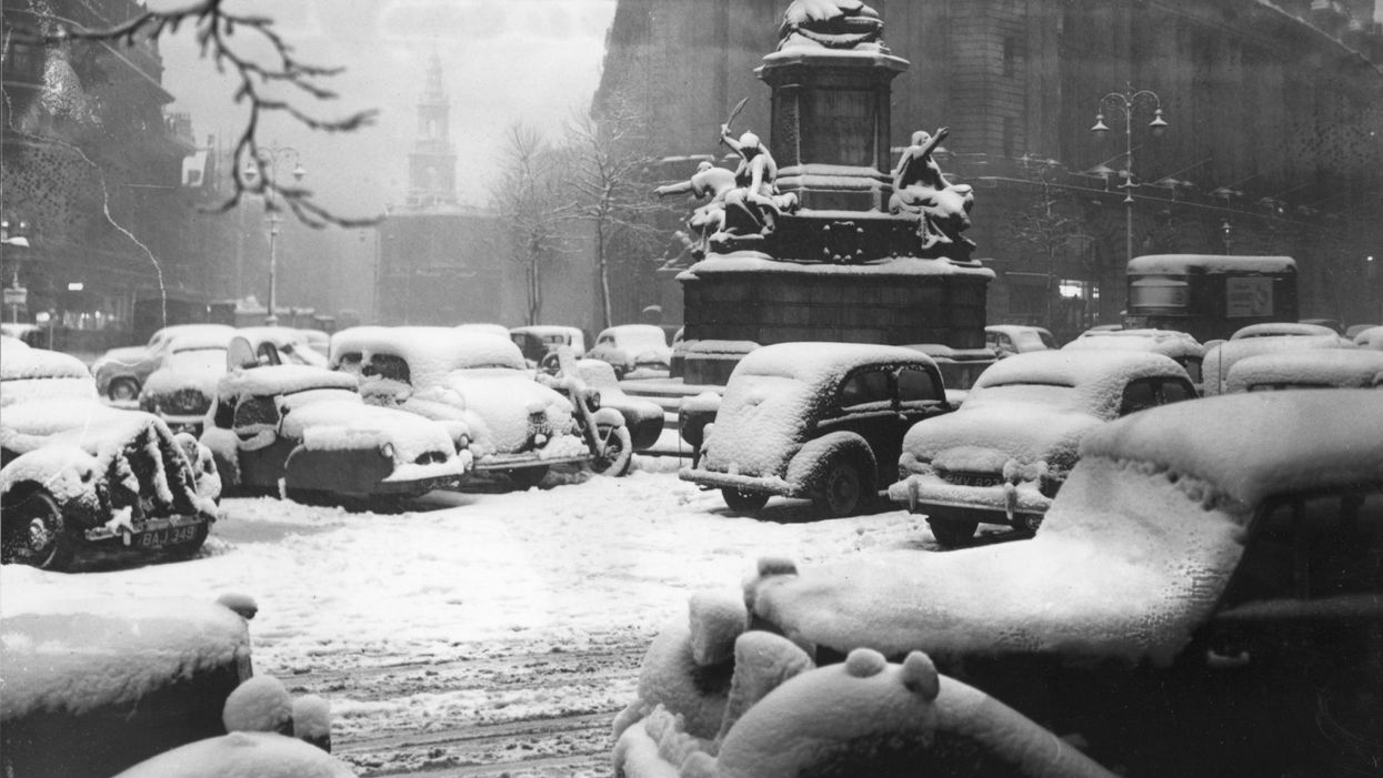 Picture: Snow-covered cars parked near Aldwych and the Strand, London