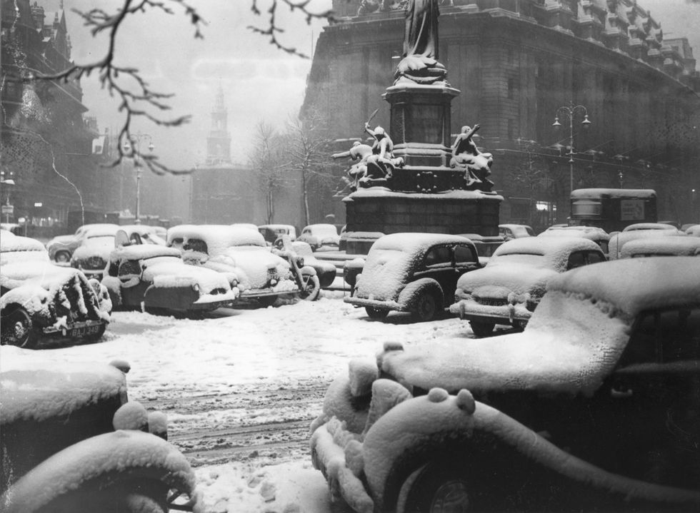 Picture: Snow-covered cars parked near Aldwych and the Strand, London