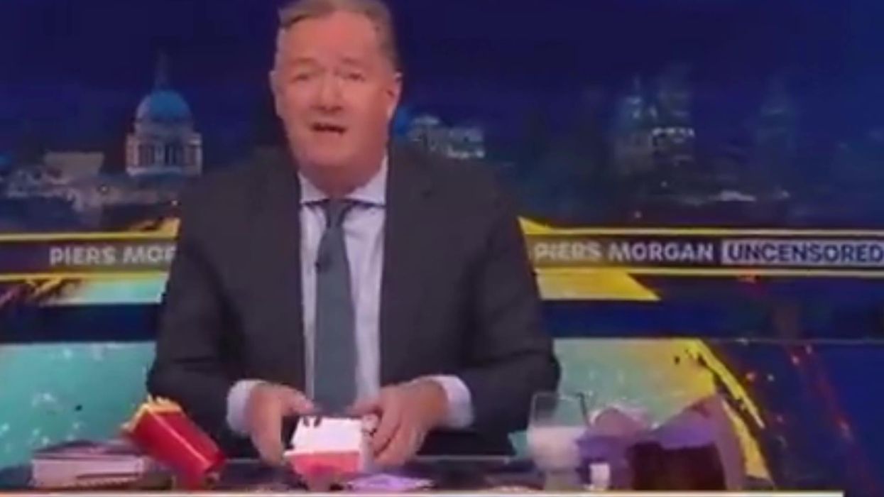Cringe moment Piers Morgan has McDonald's delivered while interviewing a vegan