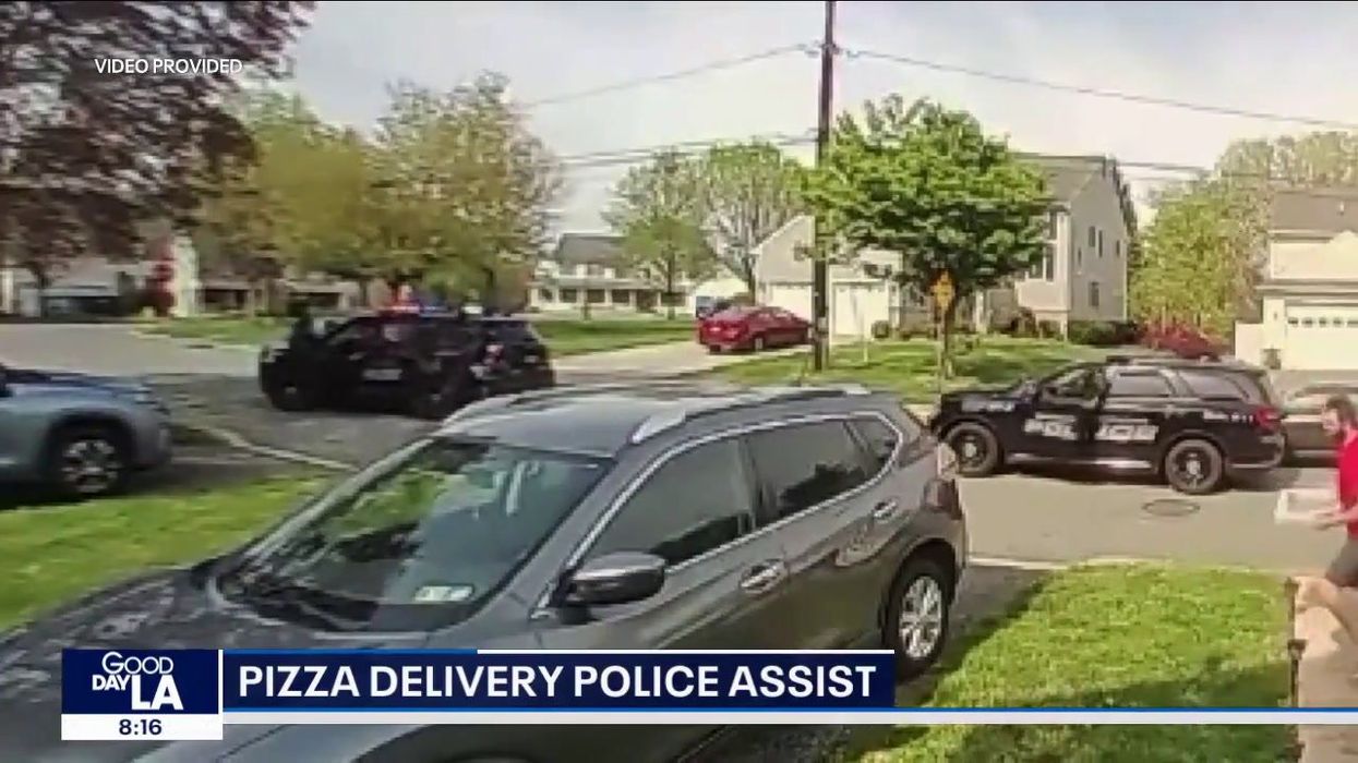 Moment takeaway delivery driver clutching pizza trips up suspect in police chase