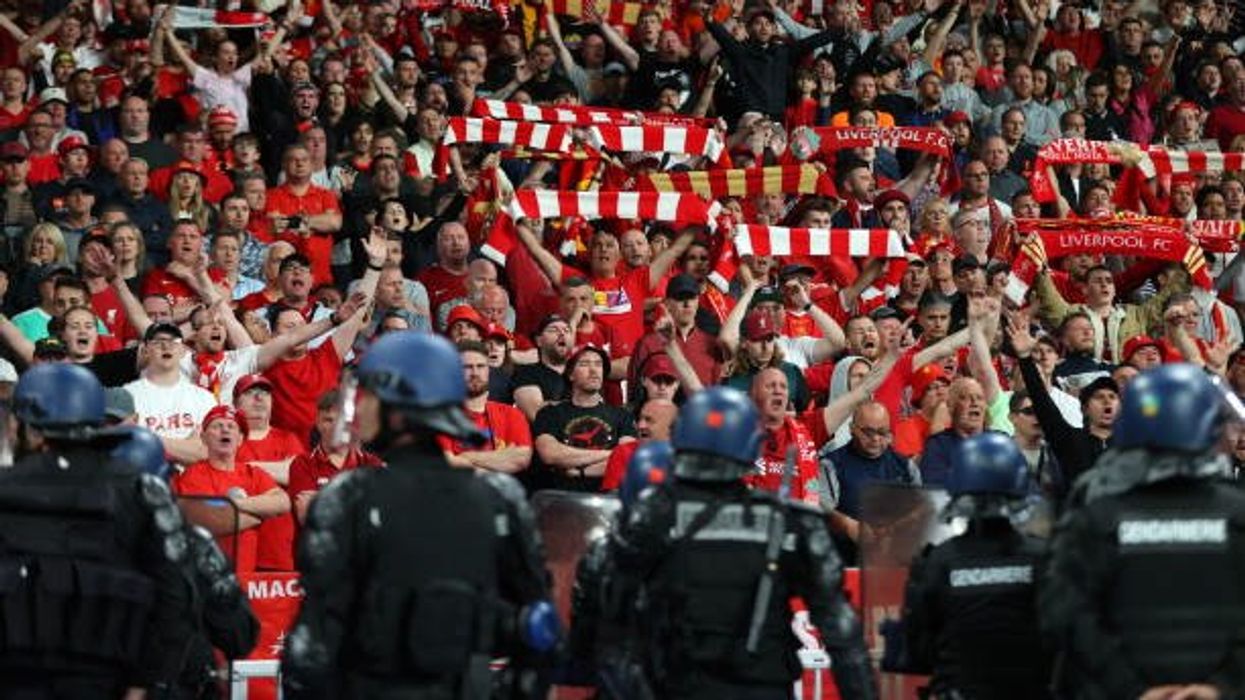 Why do Liverpool fans boo the national anthem?