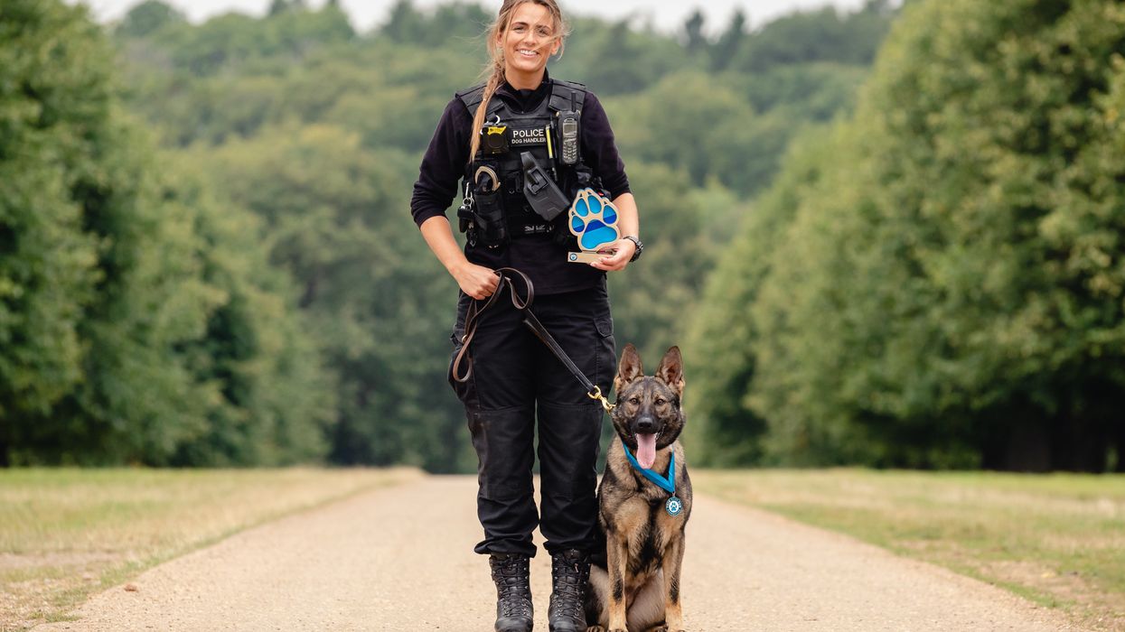 Police dog handler Pc Megan West and German shepherd Calli (Penny Bird/Thin Blue Paw Awards/PA)