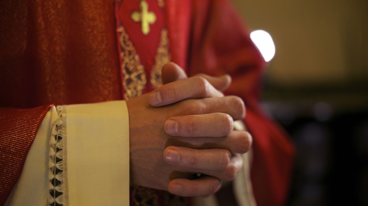 Priests set to receive QR codes to show they're not sex offenders