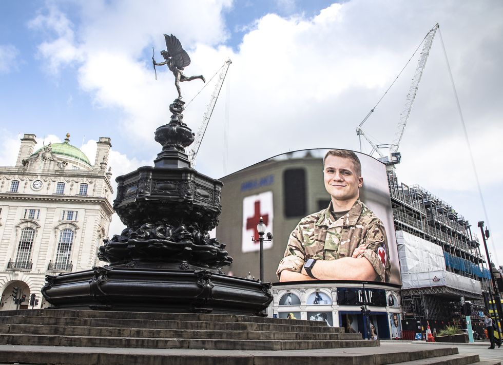Portraits of Armed Forces personnel appeared on the billboards of Piccadilly Circus