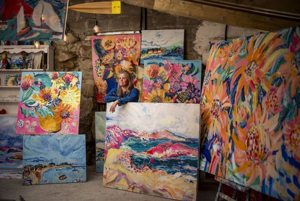 Powell's works, in all shapes and sizes, are bright and colourful (Ben Birchall/PA)