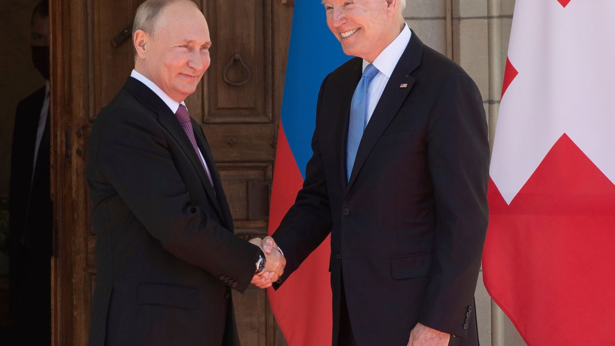 <p>President Vladimir Putin and President Biden shake hands</p>