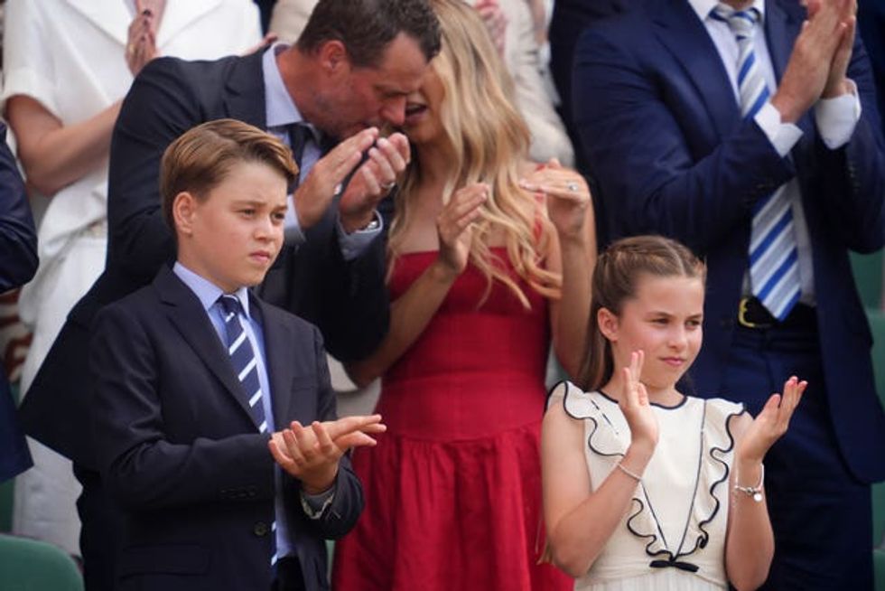 Prince George and Princess Charlotte in the Royal Box on day fourteen of the 2025 Wimbledon Championships at the All England Lawn Tennis and Croquet Club, London