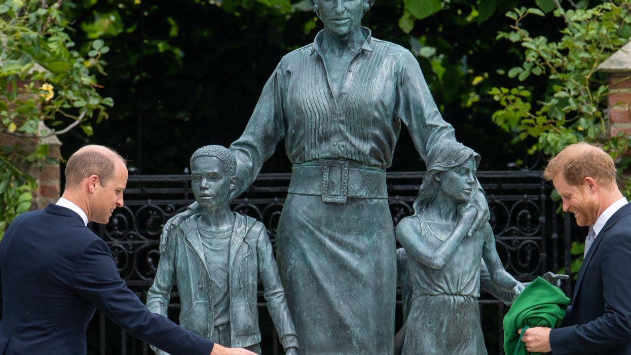<p>Prince William and Prince Harry with the new statue of their mother, Diana</p>