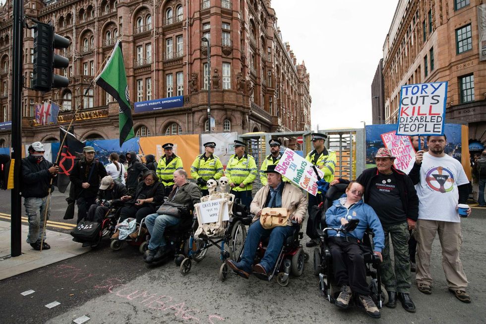 Protesters during the Tory Party conference