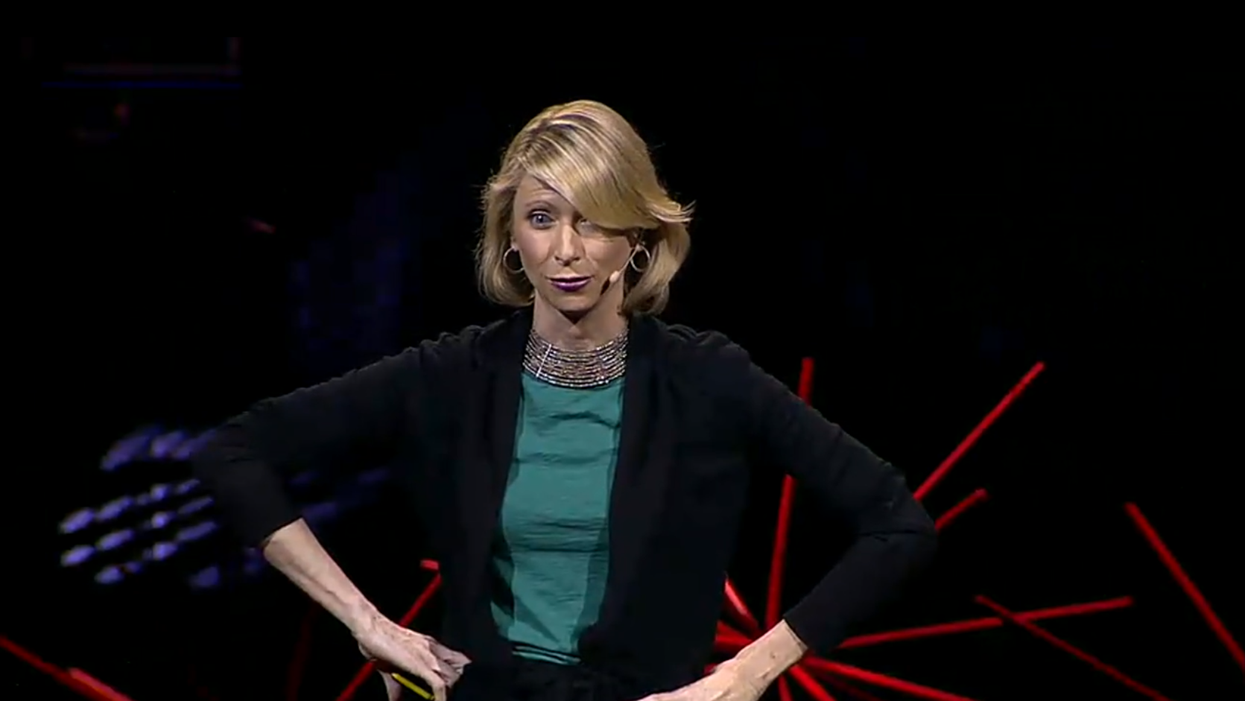 Psychologist Amy Cuddy assumes a 'high power' pose