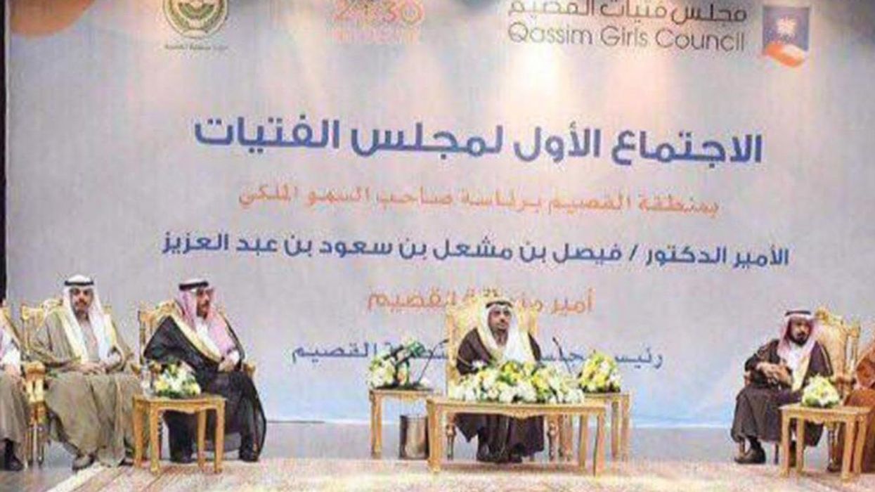 Publicity photos for the inaugural girls' council in al-Qassim showed 13 men on stage and no women TWITTER