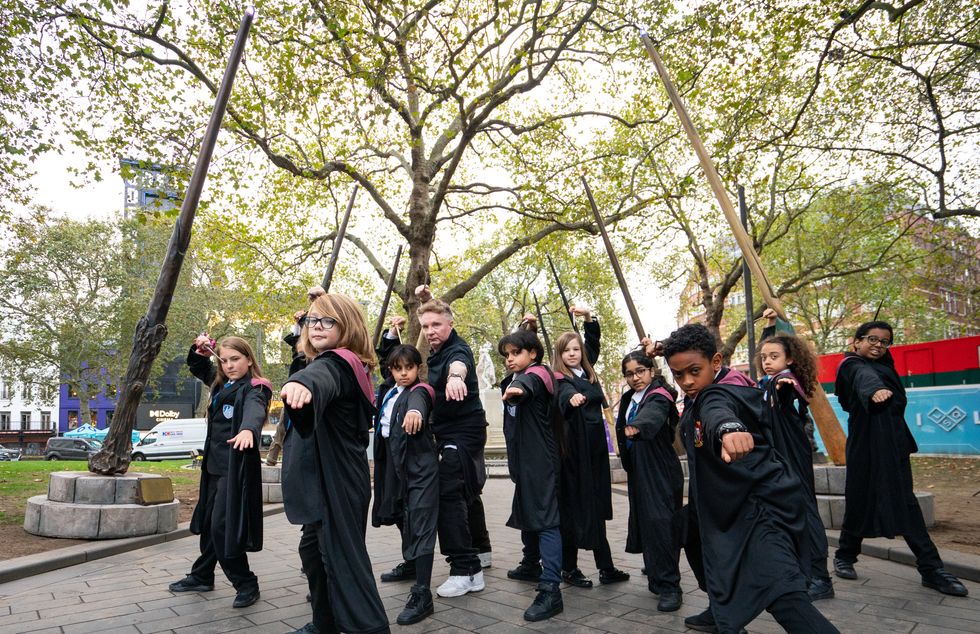 Pupils from Park View School in north London took part in a class on using wands (Dominic Lipinski/PA)