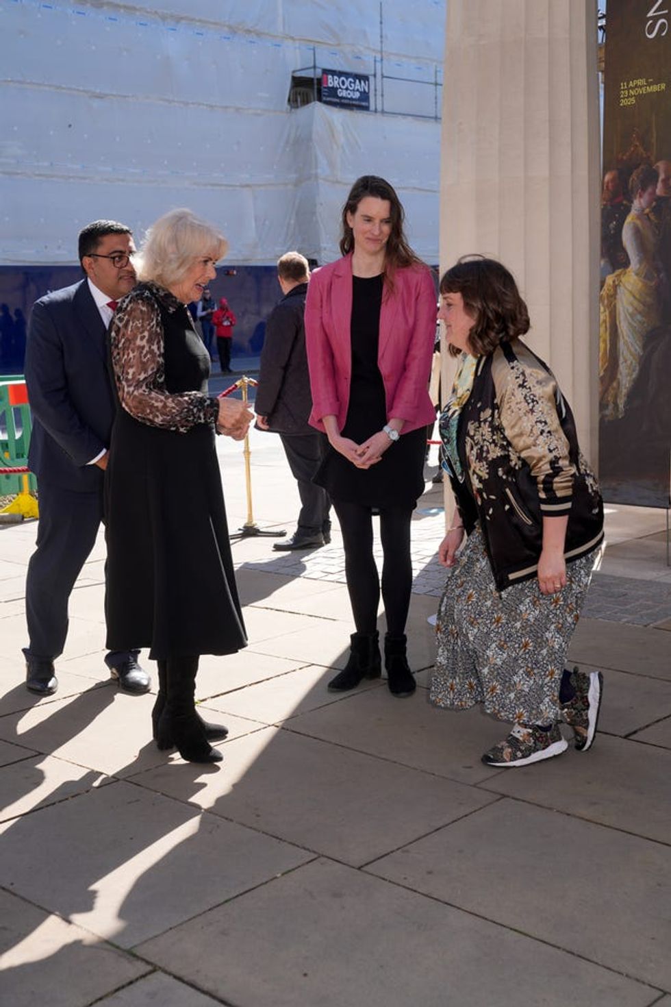 Queen Camilla meets Hilary Thomas (centre), the head of fundraising at Elephant Family, and Alice Shirley (right) the painter of \u2018Green Man Humpty Dumpty Egg\u2019
