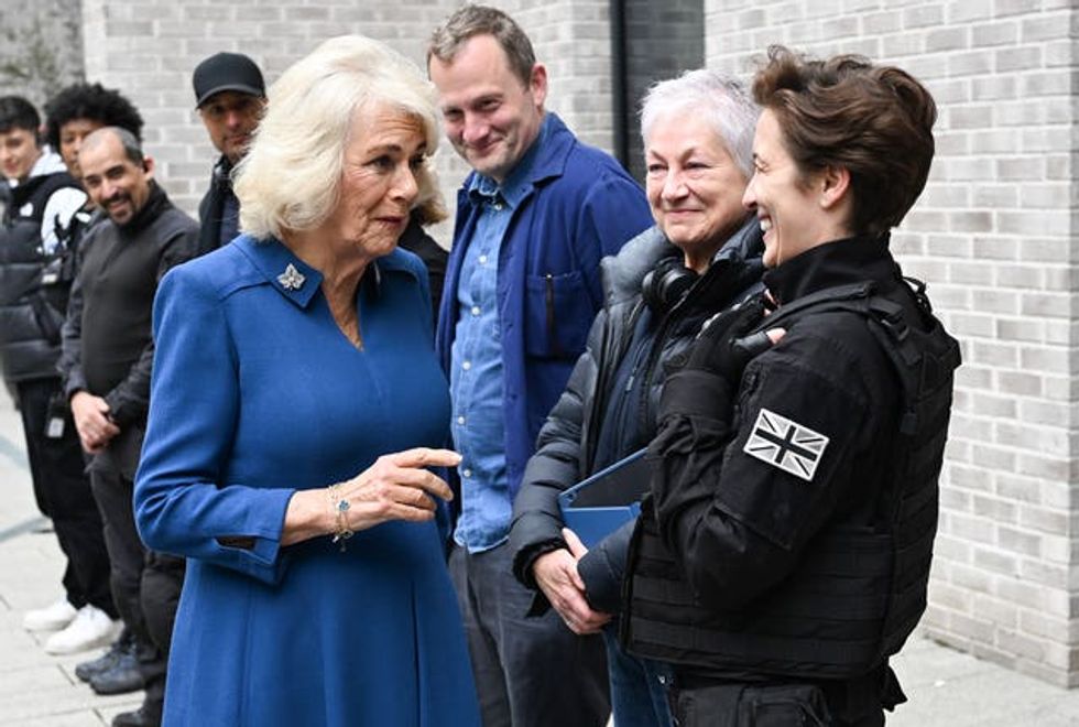 Queen Camilla meets Vicky McClure during a visit to the set of ITV drama Trigger Point in north London