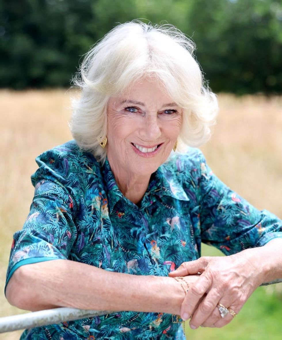 Queen Camilla posing for a portrait to mark her birthday in the garden of her home Ray Mill House in the village of Lacock