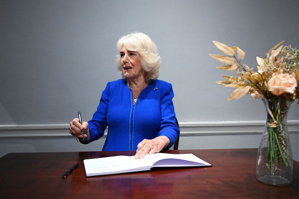 Queen walks in footsteps of Charles Dickens on visit to his former home