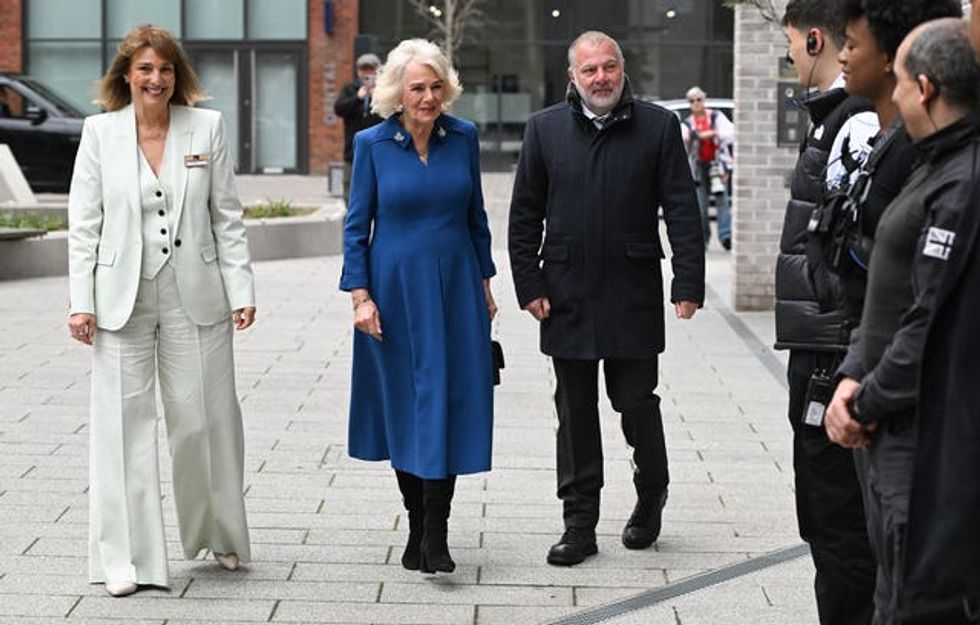 Queen Camilla with Dame Carolyn McCall, chief executive of ITV, and executive producer Jed Mercurio during a visit to the set of ITV drama Trigger Point in north London